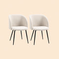 2er Set Esszimmerstühle in Cremeweiß (Lammwoll-Optik). Moderne Polsterstühle mit ergonomisch gewölbter Rückenlehne und schwarzen Stahlbeinen.