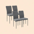 4er Set moderner Esszimmerstühle in dunkelgrauer Samtoptik mit hohem, gestepptem (Diamantmuster) Rücken. Polsterstühle mit schwarzen Metallbeinen.