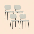 4er Set Esszimmerstühle Weiß Bouclé Stoff armloses Design mit schwarzen Metallbeinen