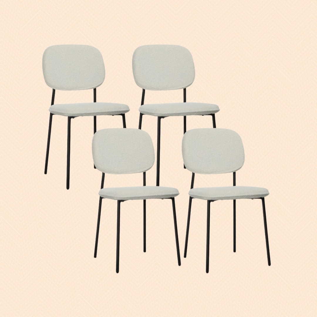 4er Set Esszimmerstühle Weiß Bouclé Stoff armloses Design mit schwarzen Metallbeinen