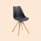 Nordischer Esszimmerstuhl – Schwarz, Kunstleder Sitzfläche, Buche Holzbeine